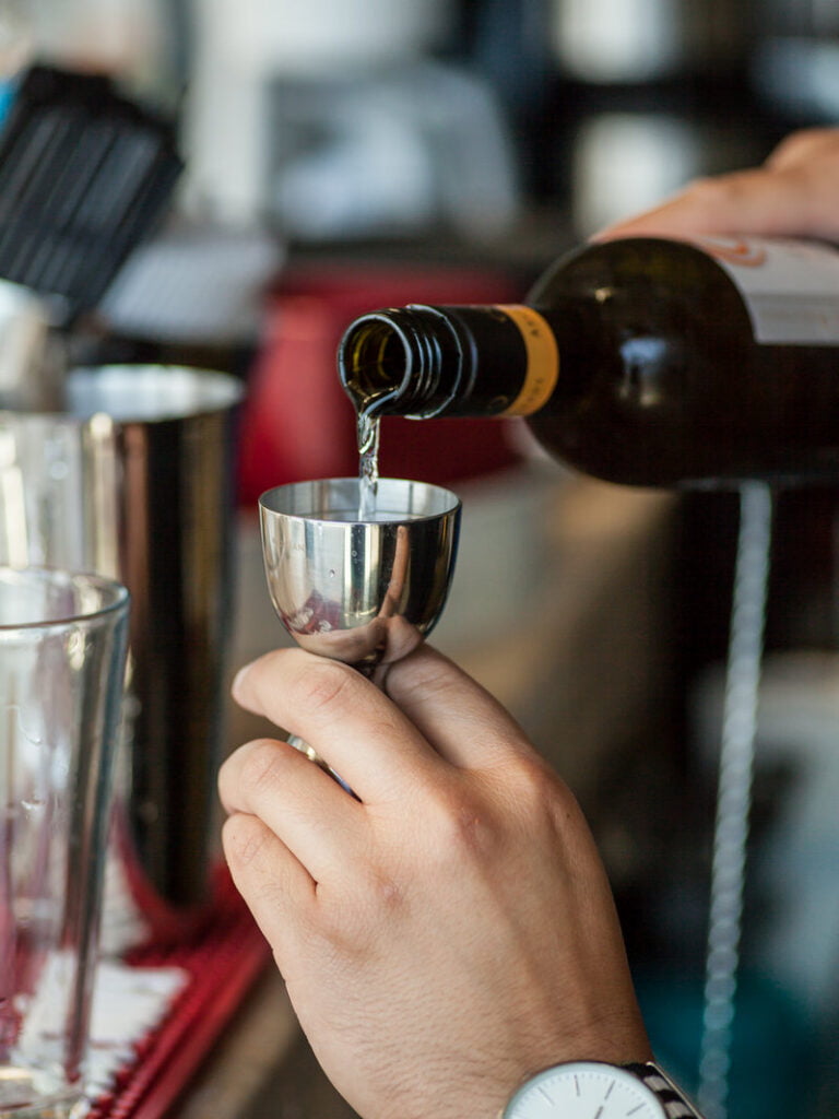 preparing a cocktail