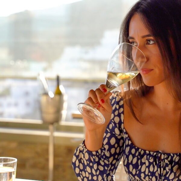 tasting white wine in the restaurant